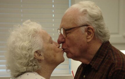 Grandparents kissing